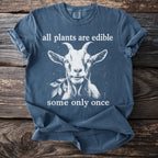 Blue t-shirt with a white graphic of a goat eating a leaf and text.