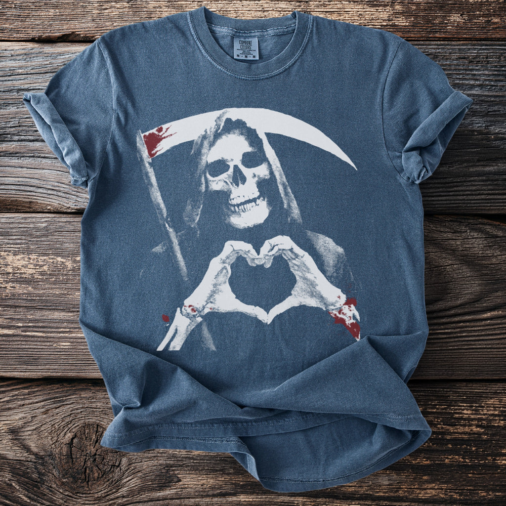 Grim reaper making a heart shape with bloody hands on a blue t-shirt.