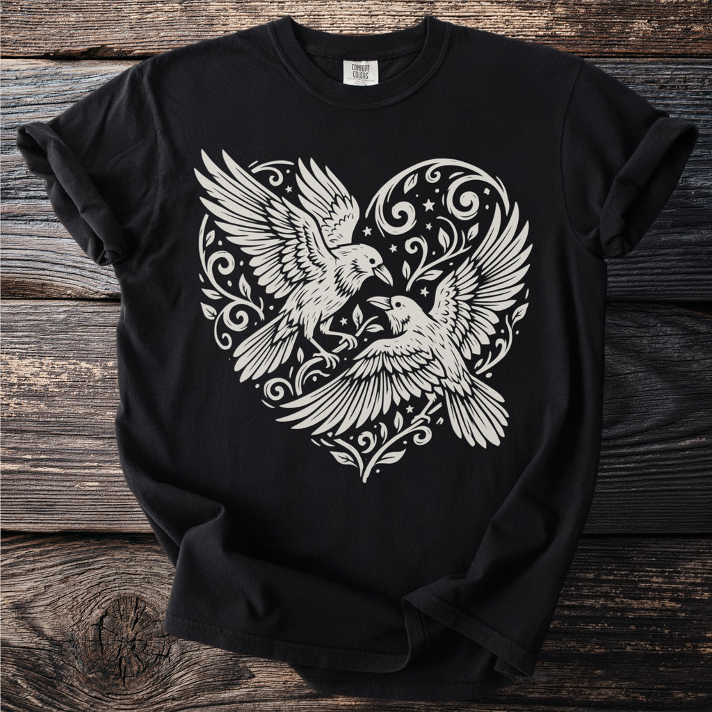 Black t-shirt with white graphic of two ravens within a heart design.