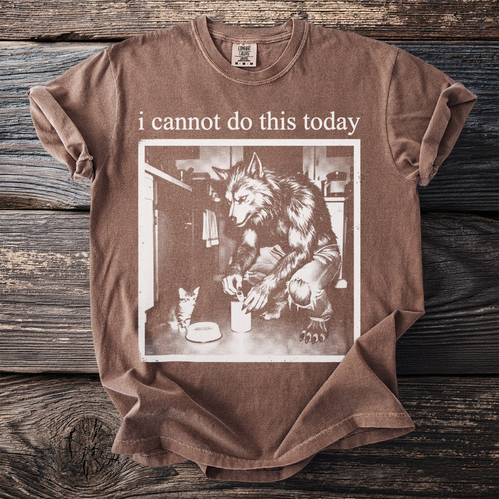 Brown t-shirt with "i cannot do this today" and werewolf feeding kitten graphic.