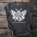 Charcoal t-shirt with a white moth graphic and the text "i ate your sweater".