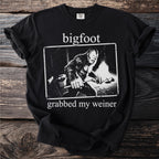 Black t-shirt with Bigfoot graphic and text "bigfoot grabbed my weiner".