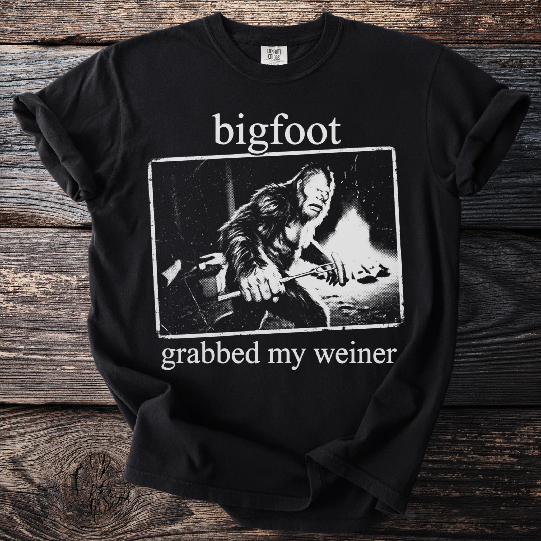 Black t-shirt with Bigfoot graphic and text "bigfoot grabbed my weiner".