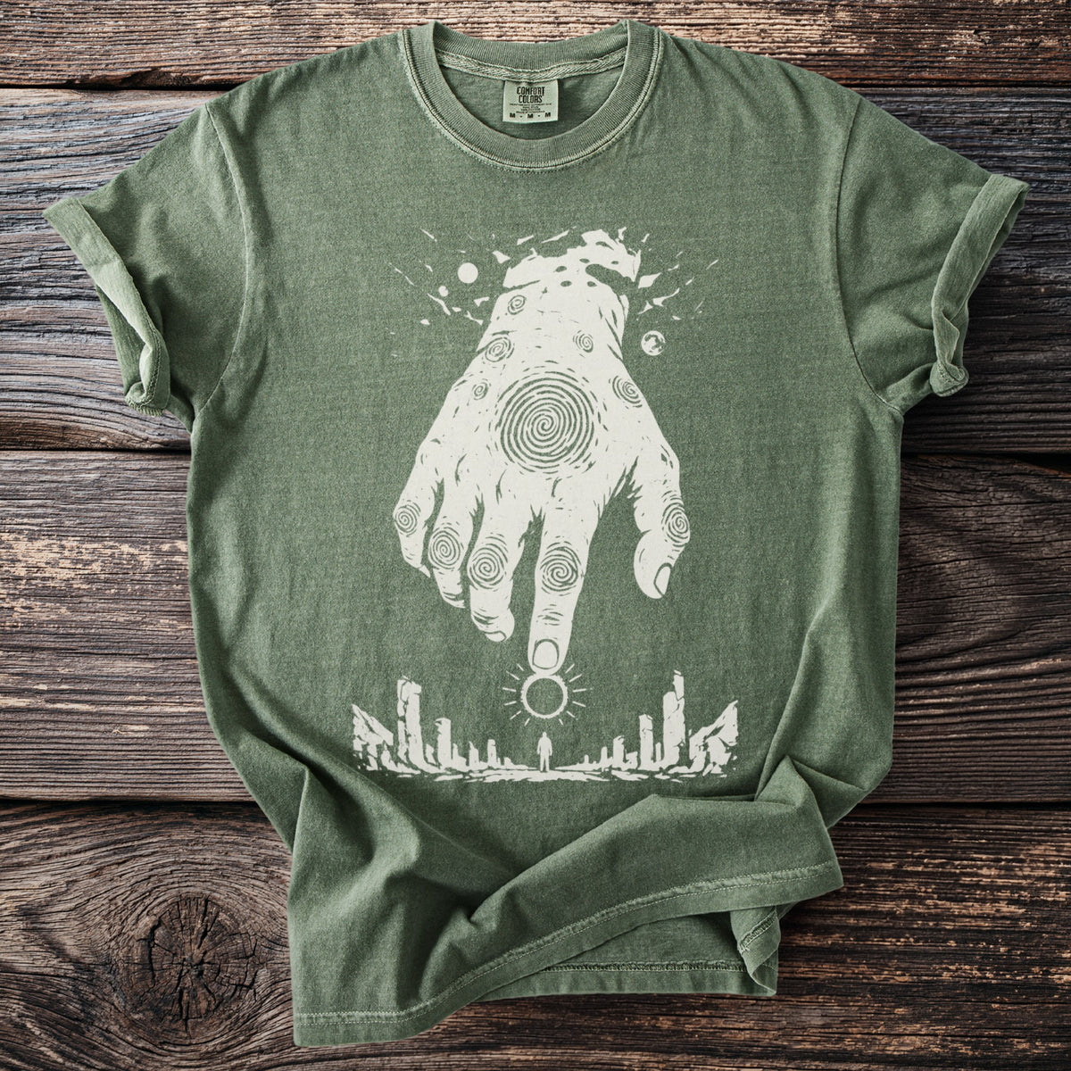 Green t-shirt with a white hand graphic over a silhouetted cityscape and sun.