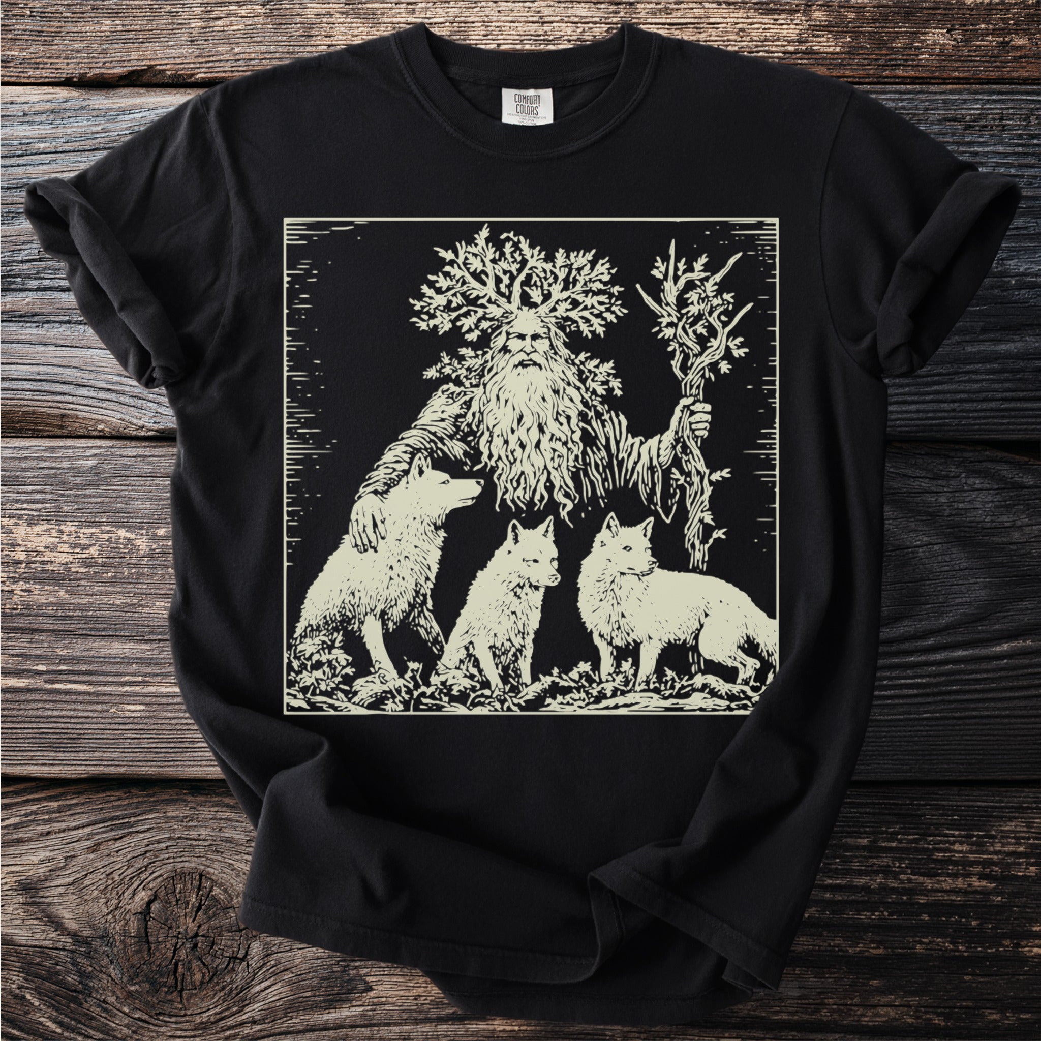 Black t-shirt with vintage-style print of a bearded man with tree branches and three foxes.