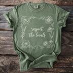 Olive green t-shirt with white floral border and "respect the locals" text.