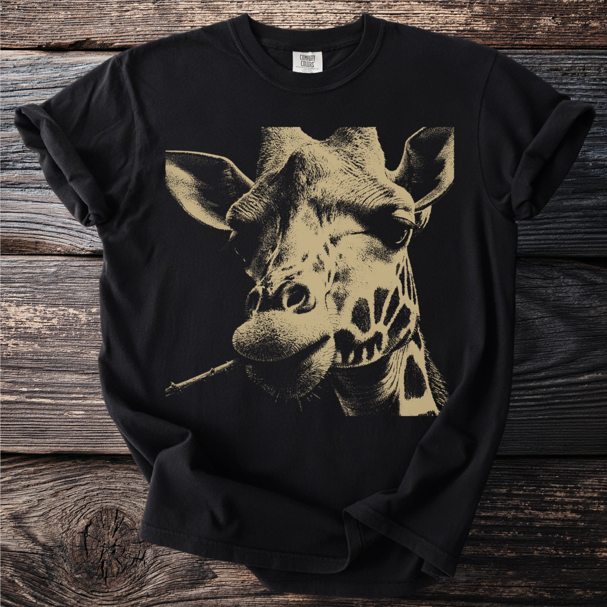 Black t-shirt with a close-up sepia-toned illustration of a giraffe's face.