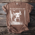Brown t-shirt with "do not perceive me" text and a close-up of a dog's face.