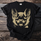 Black t-shirt with a tan screenprint of a bat's face.
