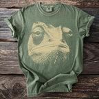 Green t-shirt with a beige chameleon face graphic and Comfort Colors label