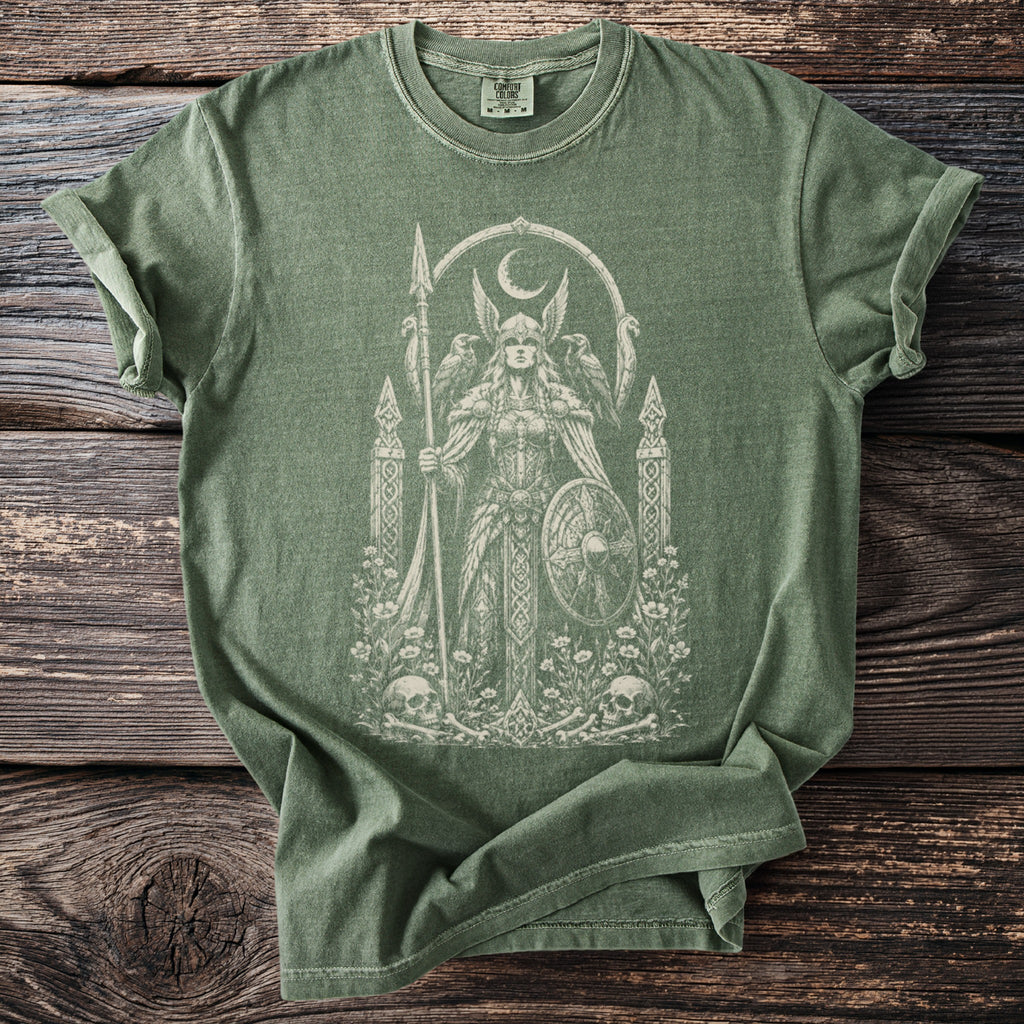 Green t-shirt with white Valkyrie graphic design, crescent moon, ravens, skulls, and flowers.