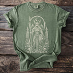 Green t-shirt with white Valkyrie graphic design, crescent moon, ravens, skulls, and flowers.