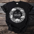 Black t-shirt with white line art of "Love the Unloved" animals in a circular wreath design.