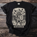 Black t-shirt with a Viking warrior illustration, a bear, a wolf, and mountains.