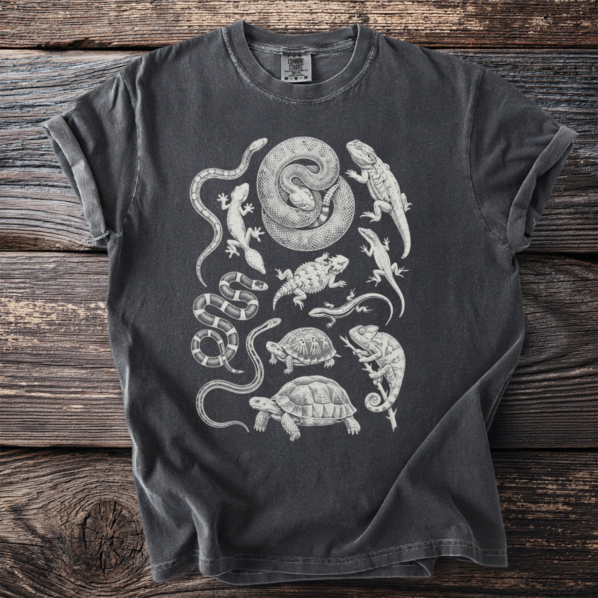 Dark gray t-shirt with vintage-style reptiles and amphibians graphic print.