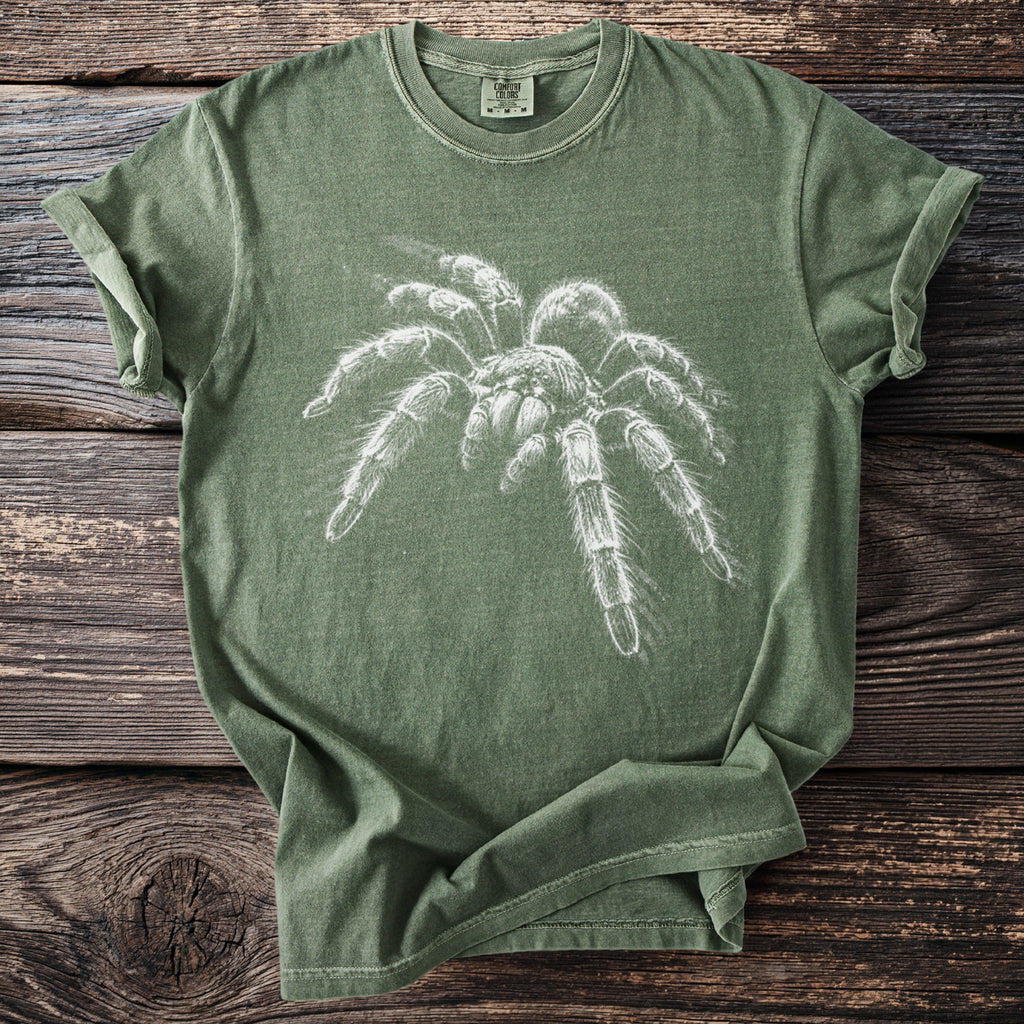 Green t-shirt with a white sketch of a tarantula and "Comfort Colors" label.