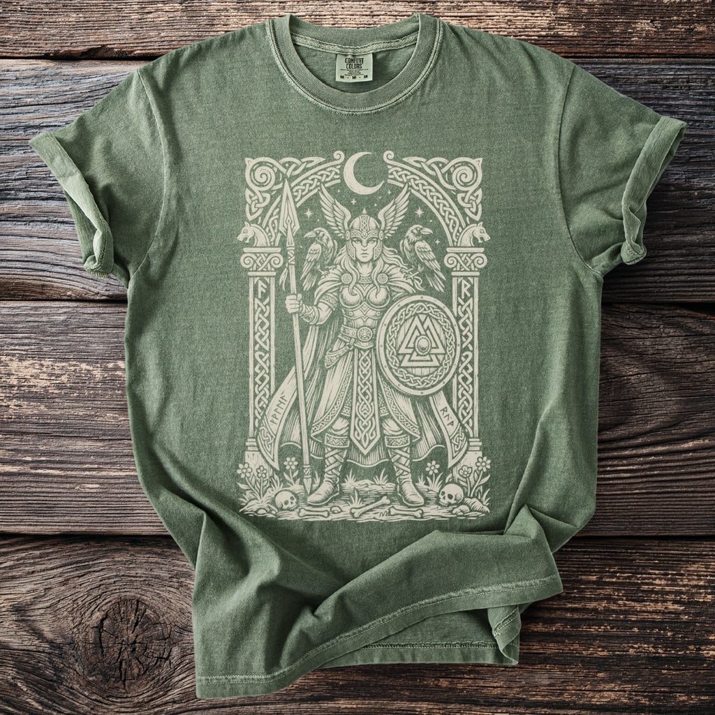 Green t-shirt with a white Viking warrior print and Celtic knotwork.