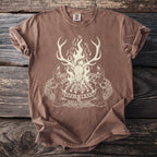 Brown t-shirt with a central graphic of a deer skull, flames, snakes, and hooded figures.