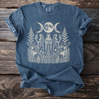 Blue t-shirt with white celestial women, deer, and botanical print.