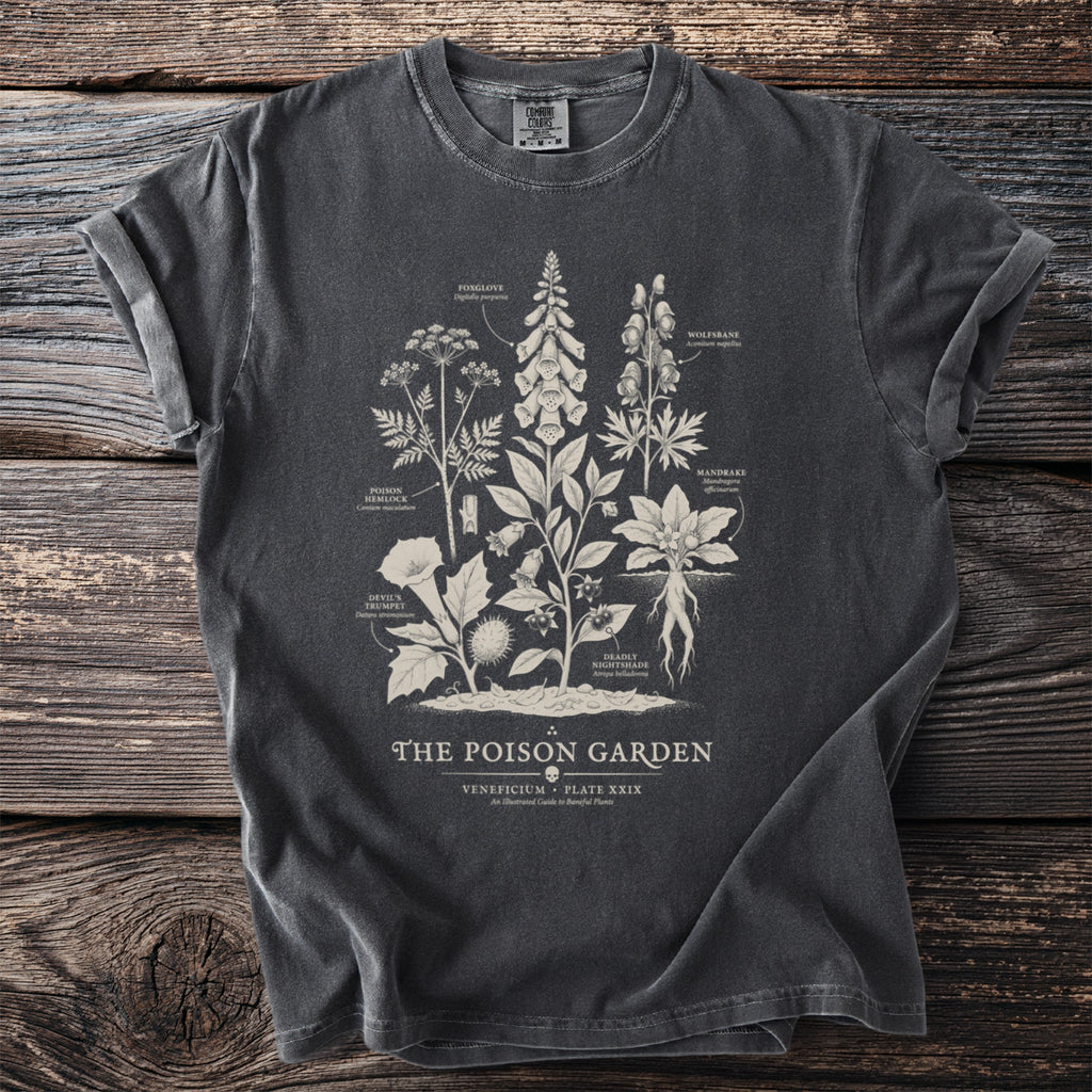 Dark grey t-shirt with illustrated poisonous plants and text "The Poison Garden".