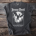 Dark grey t-shirt featuring "Jersey Devil" graphic and "The Pine Barrens Residency" text.