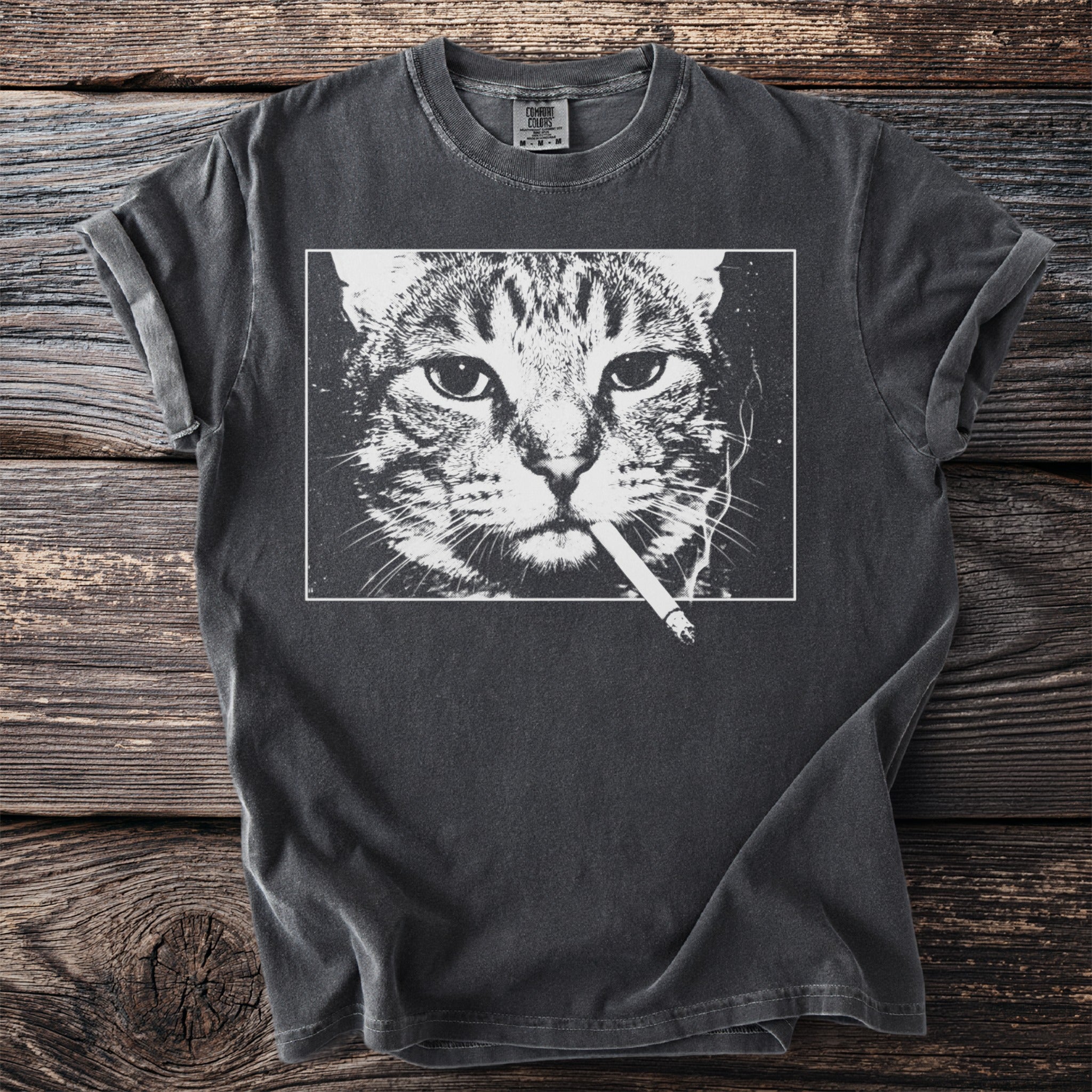 T-shirt with black and white print of a cat smoking a cigarette.