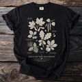 Black t-shirt with botanical illustration of trees including sugar maple, silver birch, and oak.