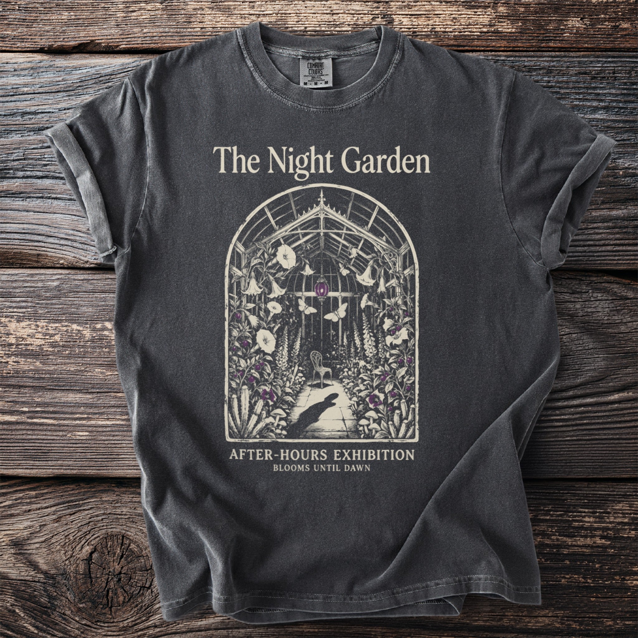 Dark grey t-shirt with "The Night Garden" graphic and text.