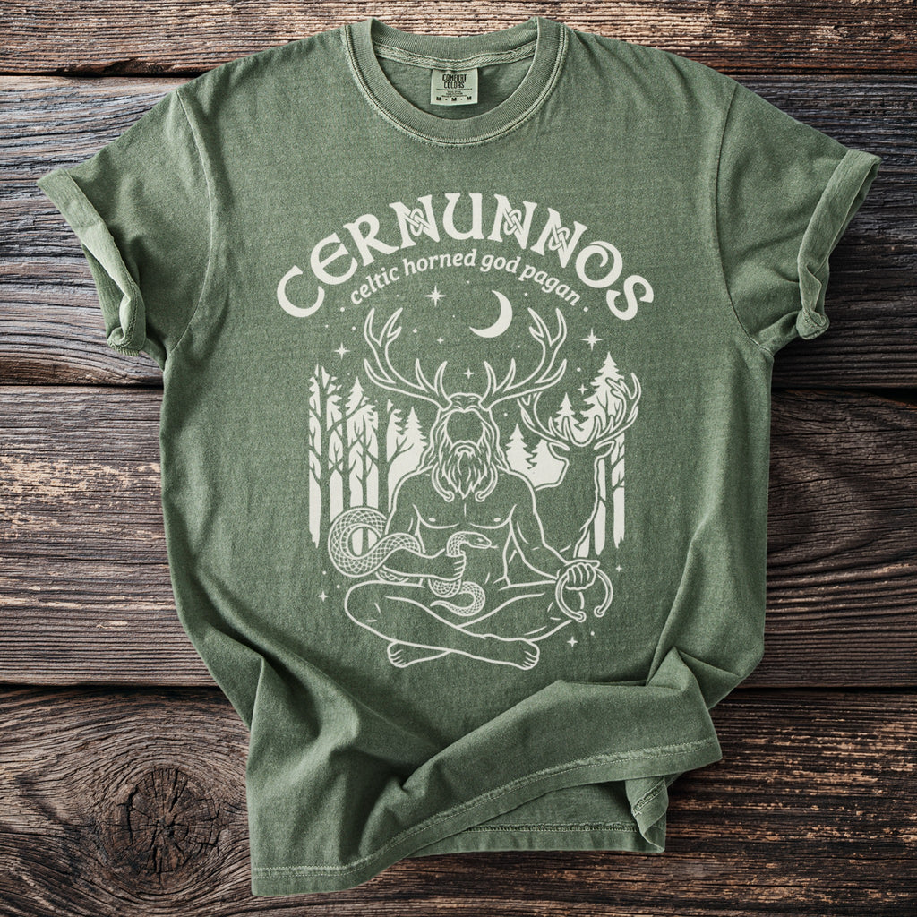 Green t-shirt with white graphic of Cernunnos, Celtic horned god, and wildlife.