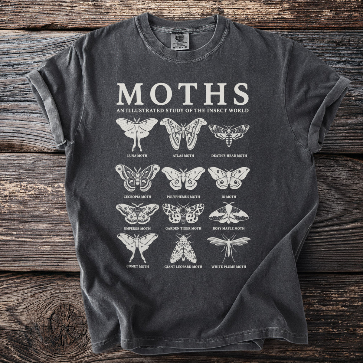 T-shirt with "MOTHS AN ILLUSTRATED STUDY OF THE INSECT WORLD" and moth illustrations.