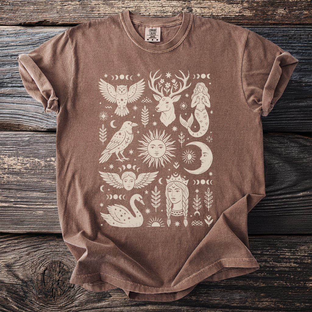 Brown t-shirt with mystical celestial and animal illustrations in cream