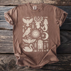 Brown t-shirt with mystical celestial and animal illustrations in cream