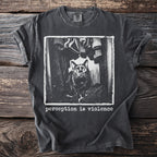 Dark t-shirt with black and white print of a cat in a closet and text "perception is violence".