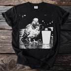 Black t-shirt with a graphic of a pigeon next to a coffee cup.