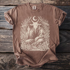 Brown t-shirt with a cream-colored graphic of a seated goat under a moon.