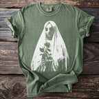 Olive green t-shirt with a white graphic of a veiled figure holding a rose.
