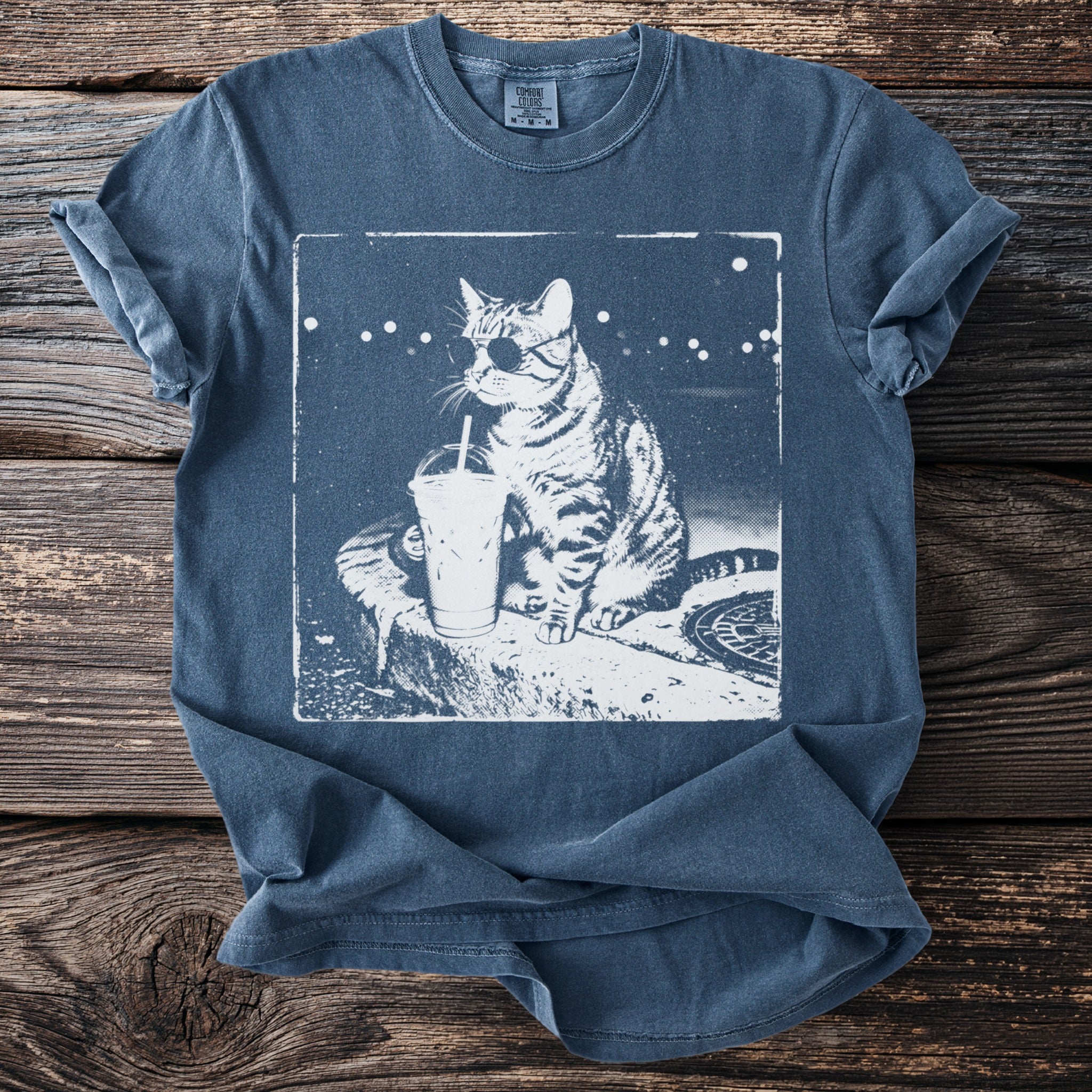T-shirt with a tabby cat wearing sunglasses and holding an iced drink.