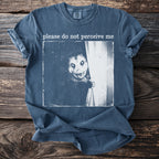 Blue t-shirt with a black and white opossum peeking from behind a curtain and text.