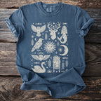 Blue t-shirt with mystical celestial and animal graphic print.