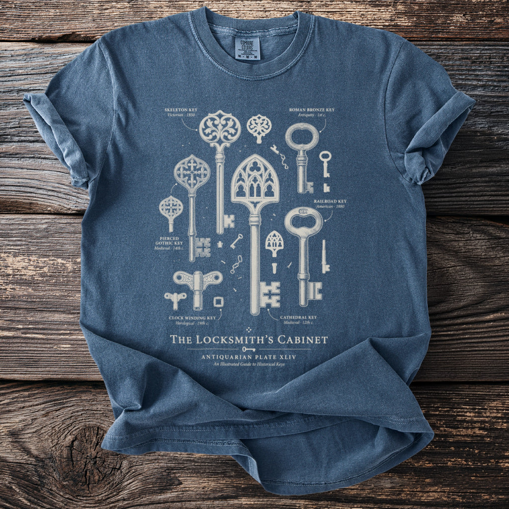 T-shirt with illustrated historical keys titled "The Locksmith's Cabinet".