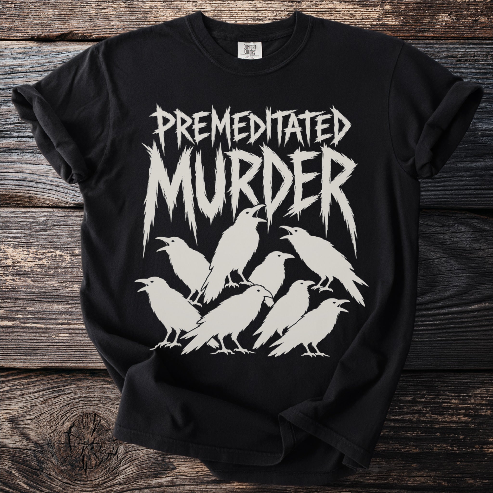 Black t-shirt with white text "PREMEDITATED MURDER" and white ravens.
