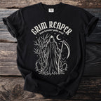 Black t-shirt with Grim Reaper, gravestones, tree, and crescent moon graphic.