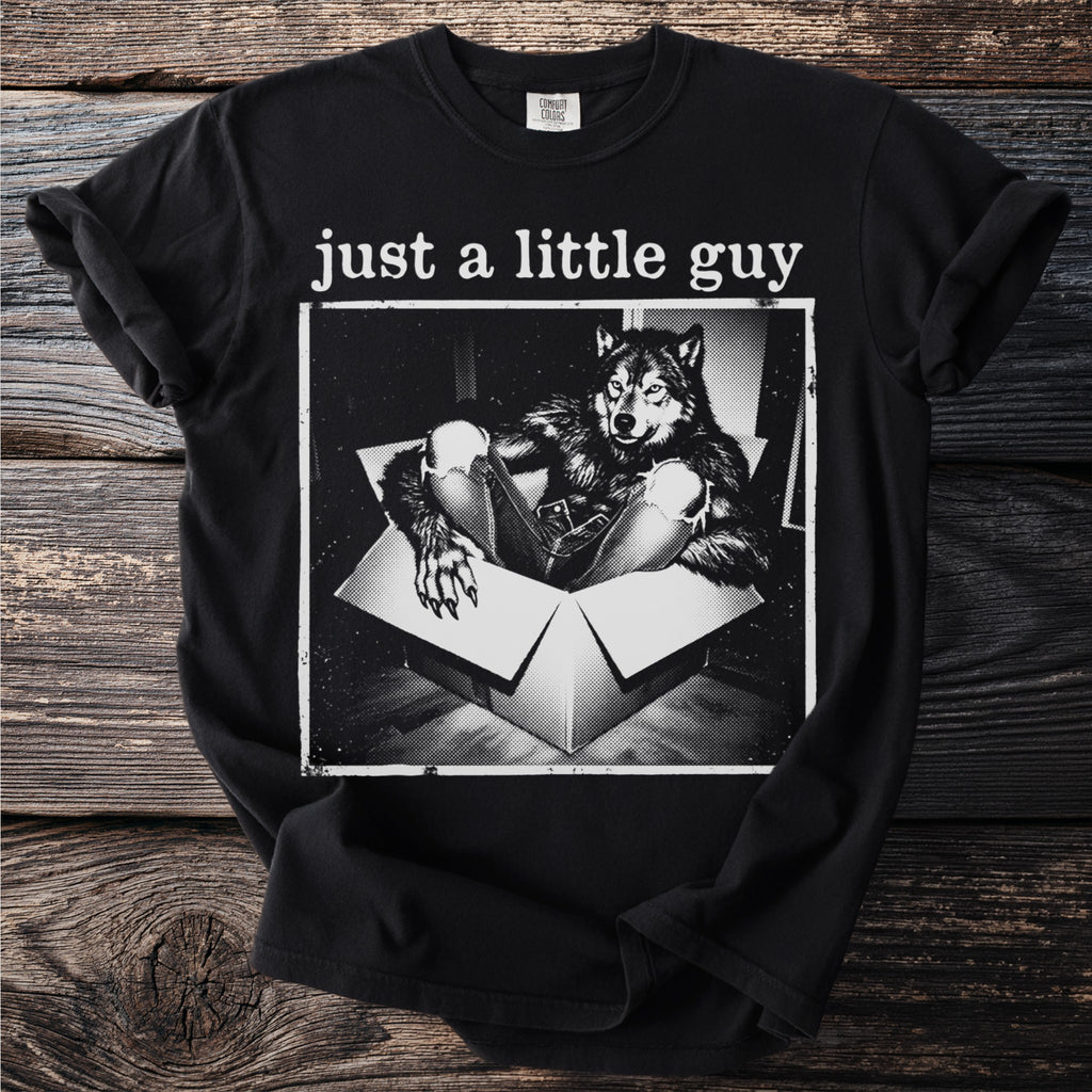 Black t-shirt with "just a little guy" text over wolf in a box graphic.