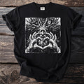 Black t-shirt with white print of a green man figure making a heart shape.