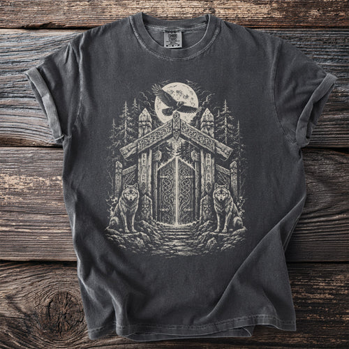 T-shirt with a dark grey graphic depicting wolves, a gateway, and a bird under a full moon.