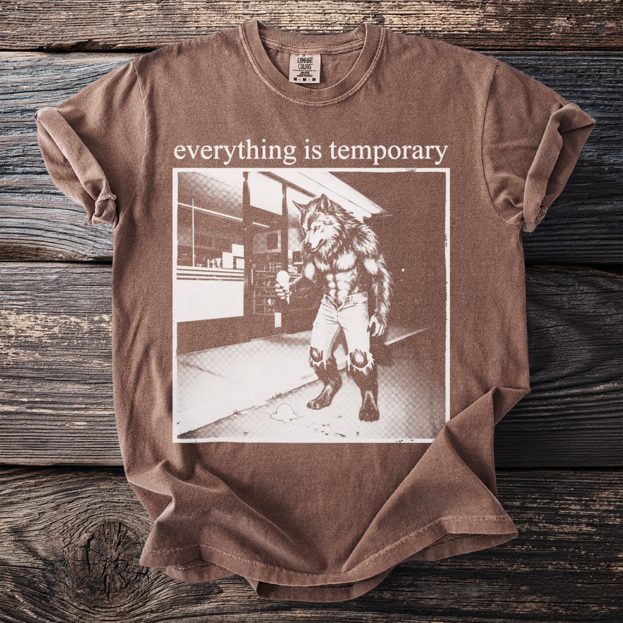 Brown t-shirt with white graphic: Werewolf holding ice cream, text "everything is temporary".