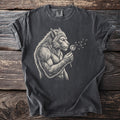 Werewolf blowing on a dandelion on a charcoal grey t-shirt.
