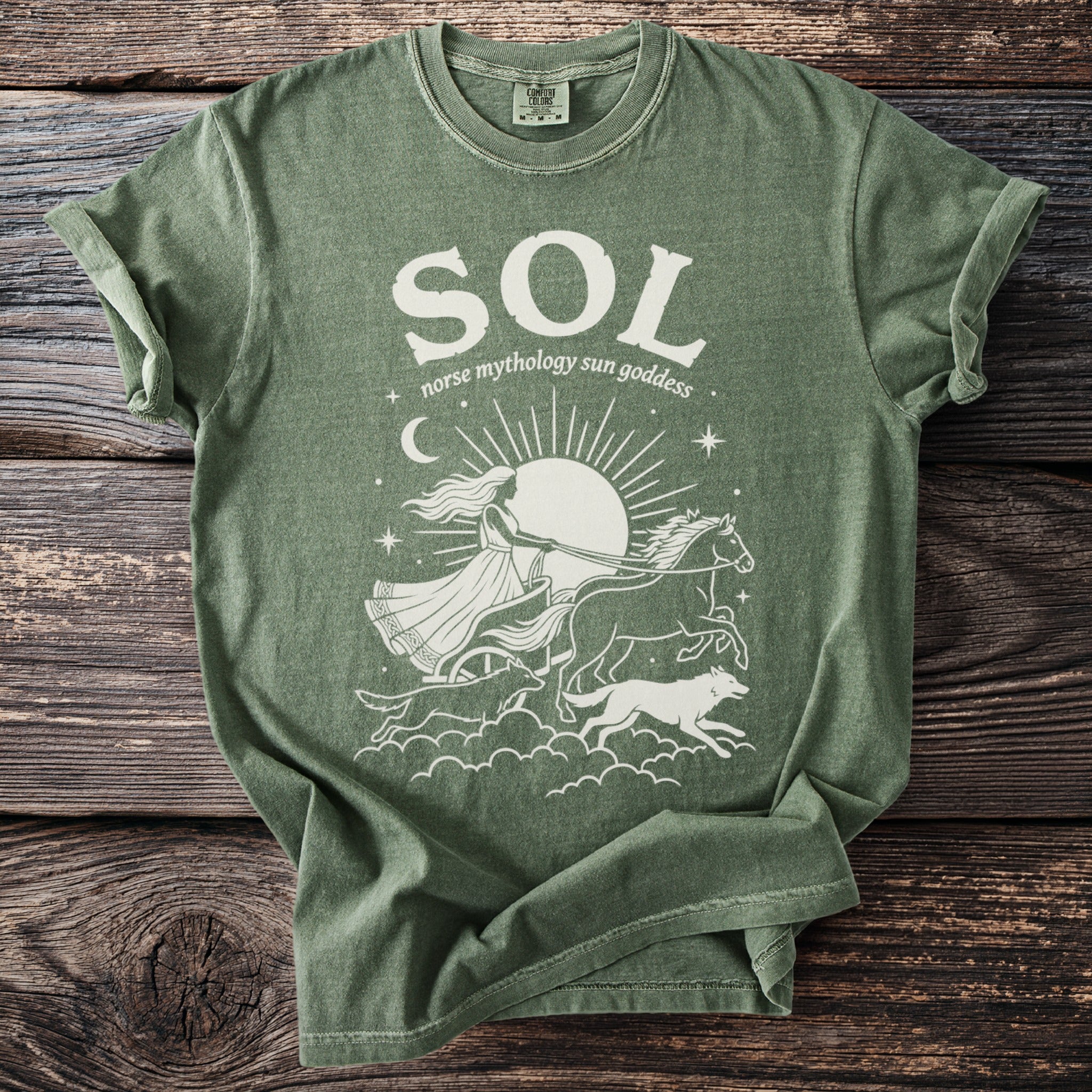 Green t-shirt with "SOL norse mythology sun goddess" graphic and imagery.