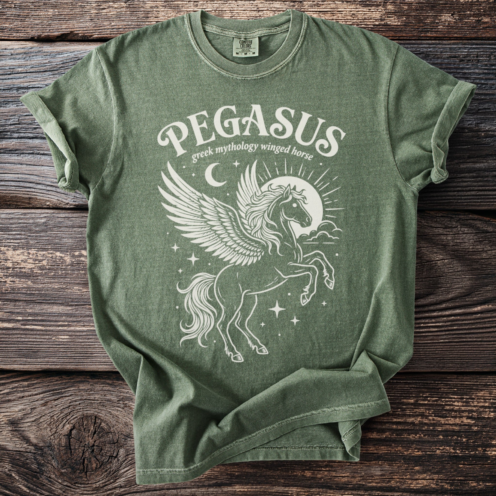 Green t-shirt with white Pegasus graphic and text "PEGASUS greek mythology winged horse".