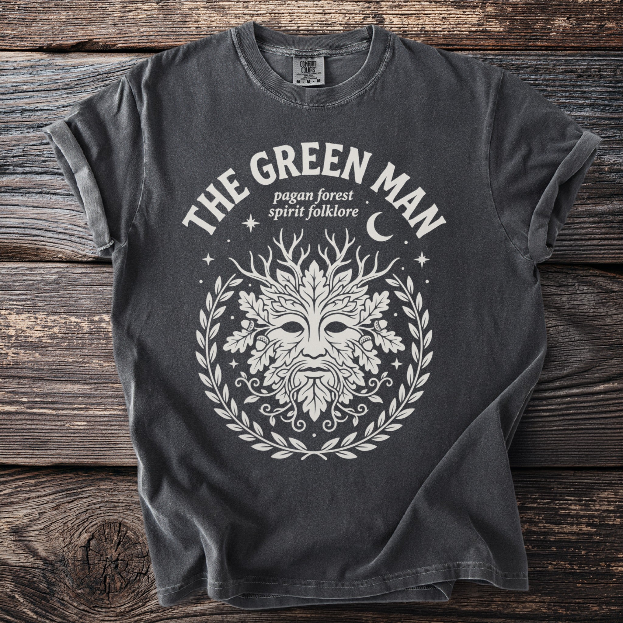 Dark grey t-shirt with a white Green Man design and text.